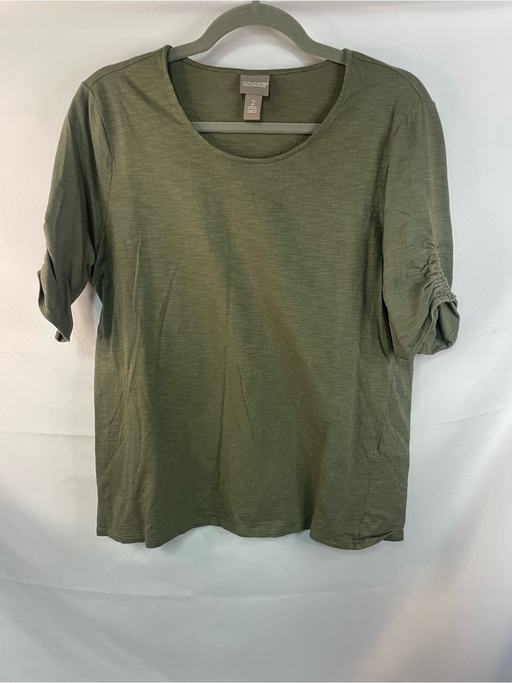 Chicos Olive Green Scoop Neck Women's Top with ruched sleeves.